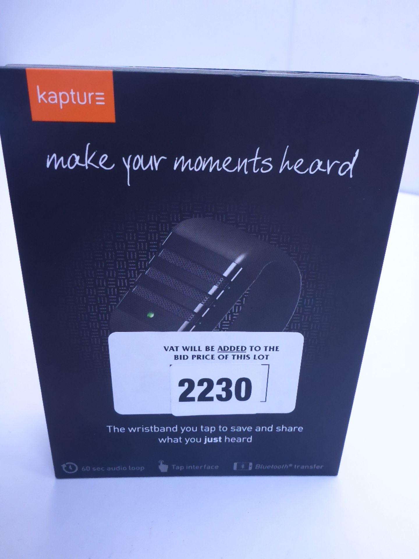 Kapture Fitness wrist band in box.