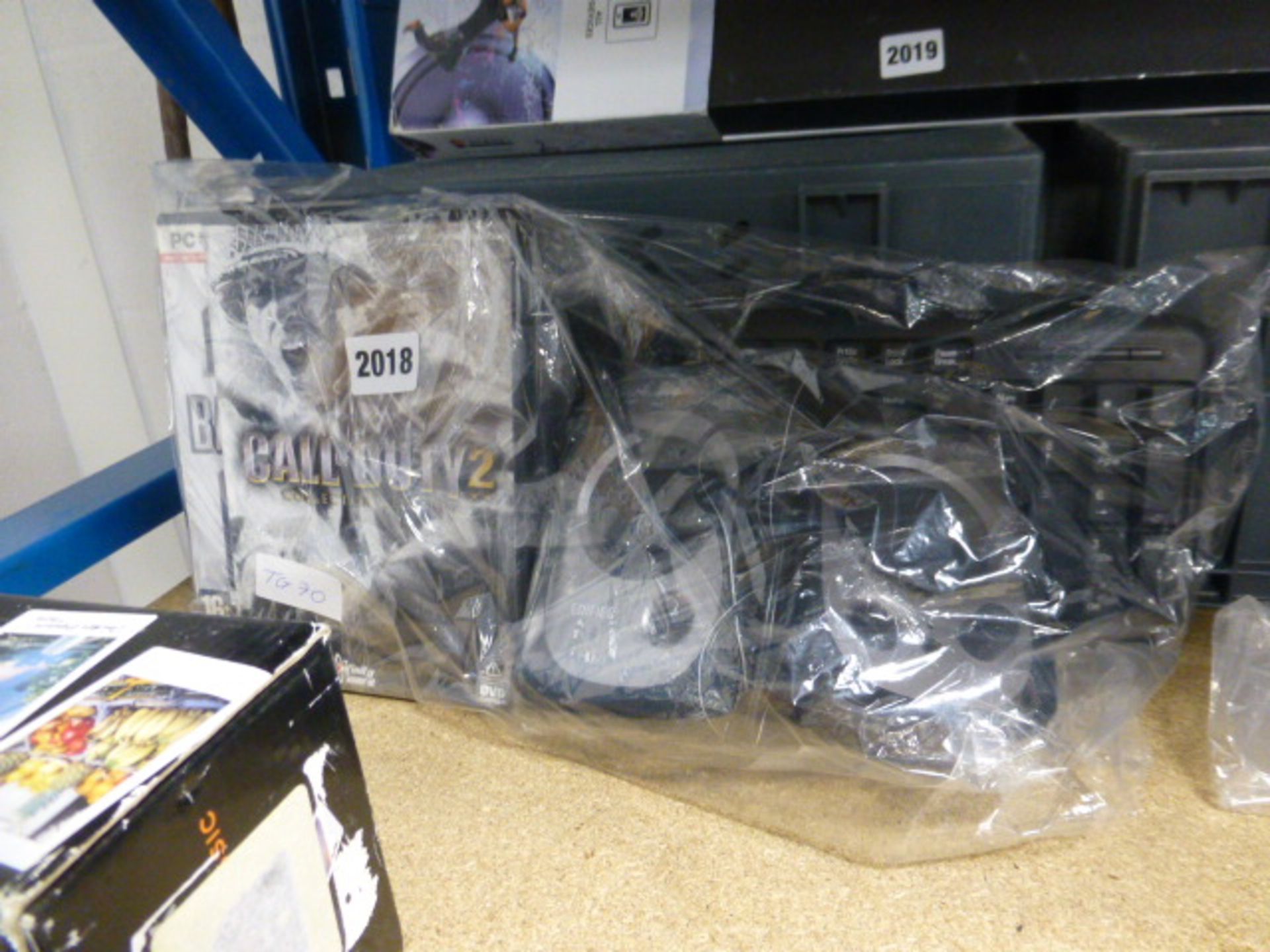 Bag of mixed PC games inc. speakers and keyboard