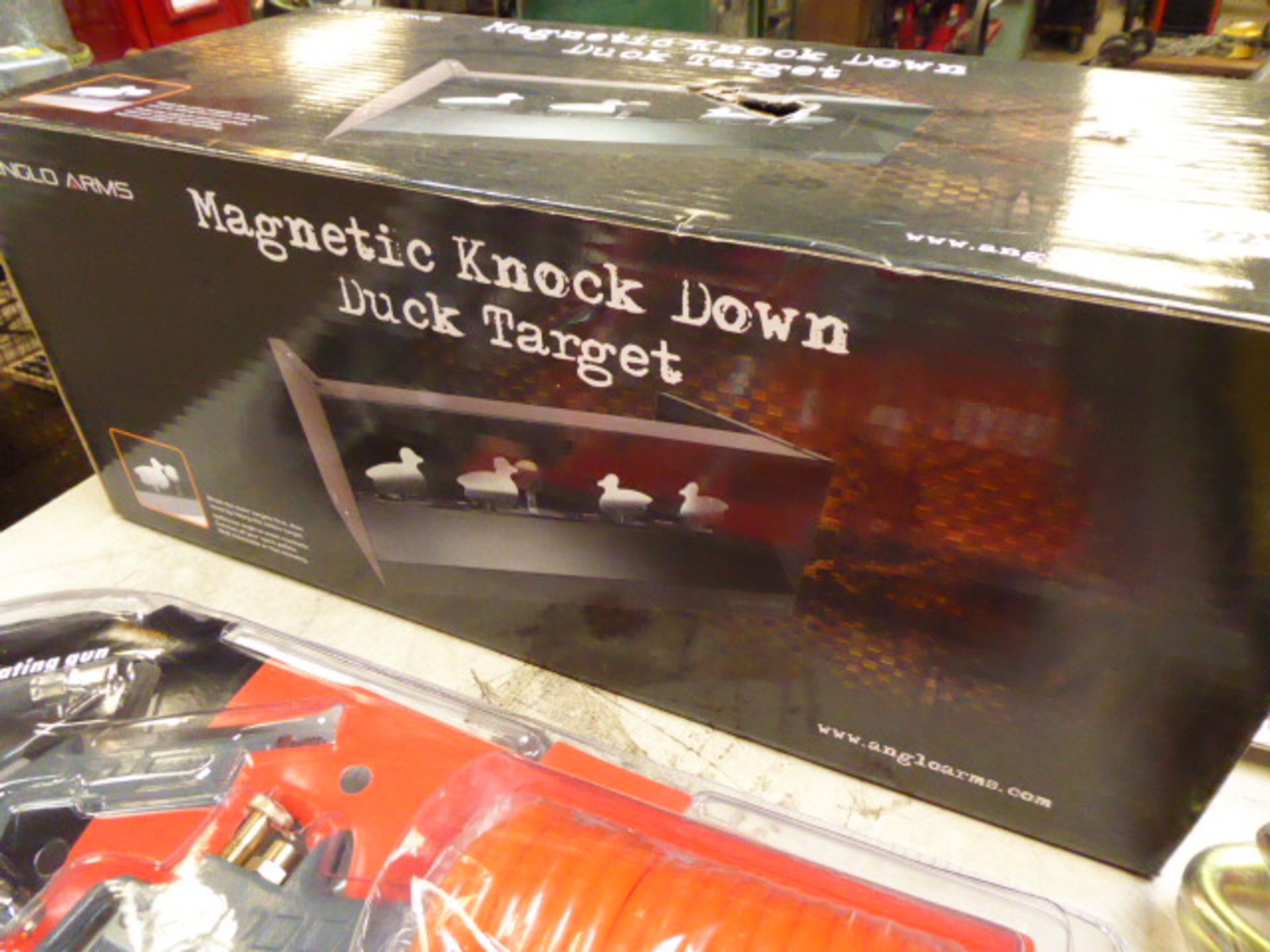 Magnetic knock down duck target