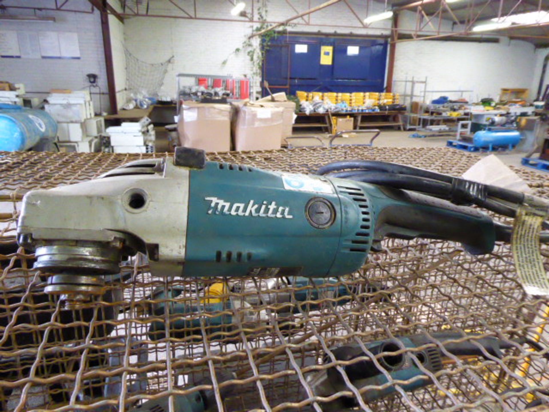 (mach) (28) Makita GA9020 9'' grinder, 110v (312413)