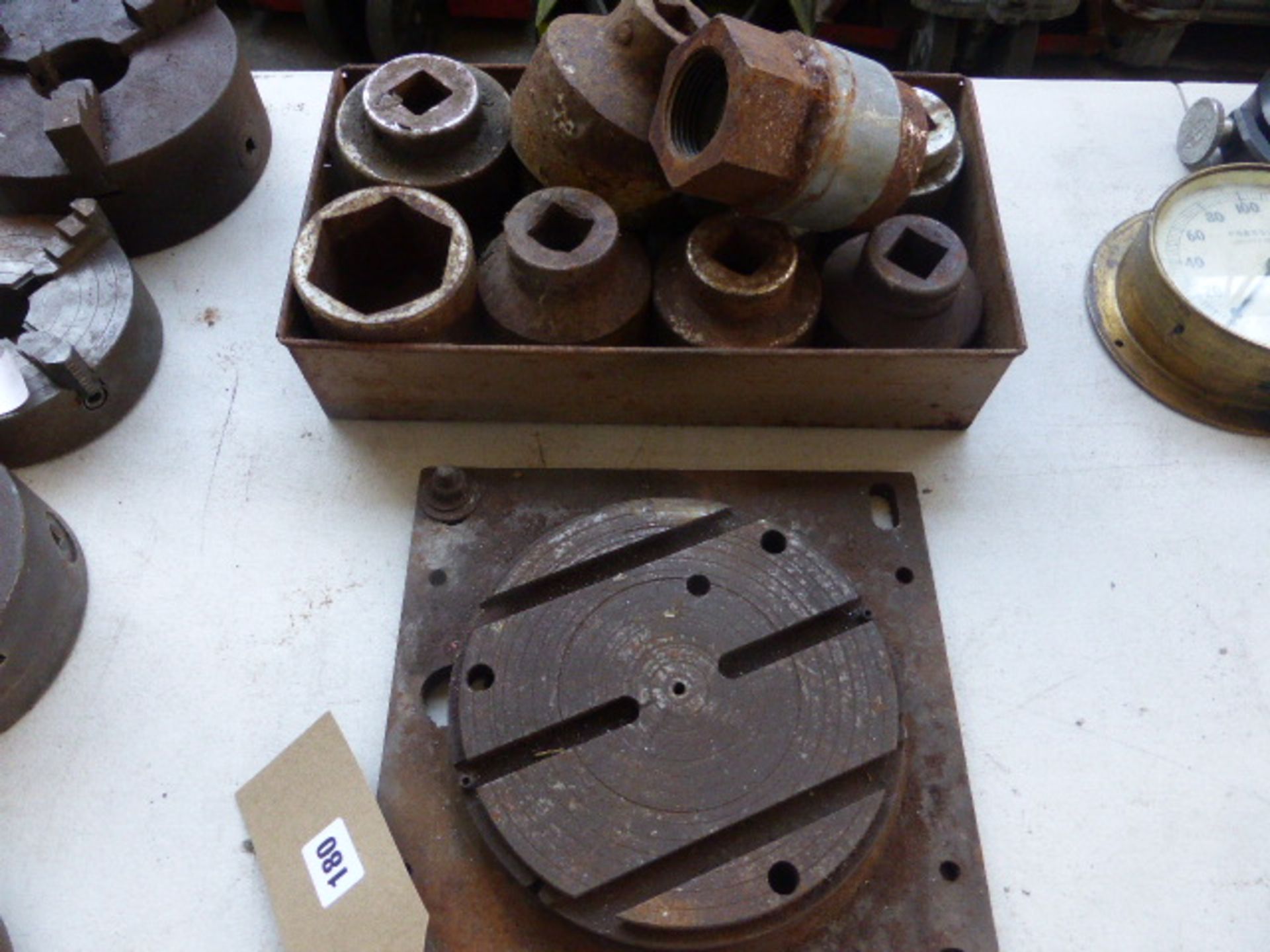 Metal tray containing 8 large sockets plus a small 8'' rotating table