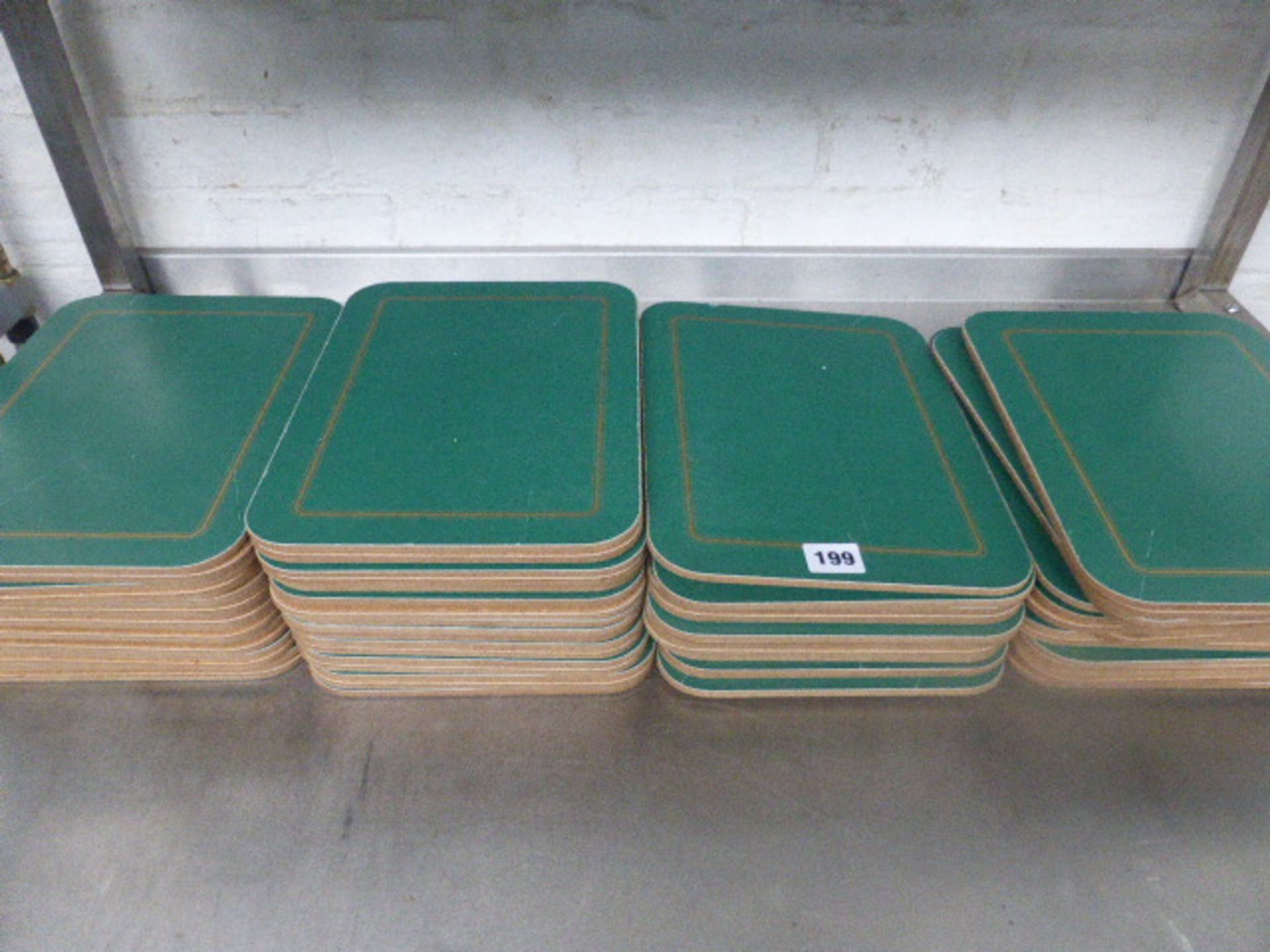 Large selection of gold and green banded place mats