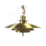 A 1970's brass coloured four-tier pull-down ceiling light in the manner of Louis Poulsen