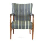 A 1960's oak and button upholstered cocktail armchair on tapering legs CONDITION REPORT: