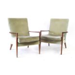 A pair of 1960's Parker Knoll armchairs with teak frames and pale green upholstery