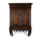 A Victorian walnut Gothic-Revival wall cabinet,