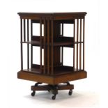 An Edwardian mahogany and crossbanded revolving bookcase, w.