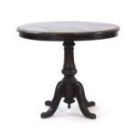 A 19th century circular table,