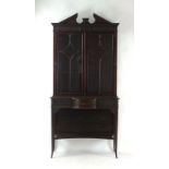 A late 19th/early 20th century mahogany cabinet on stand,