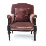 A Victorian ebonised, gilt highlighted and upholstered armchair,