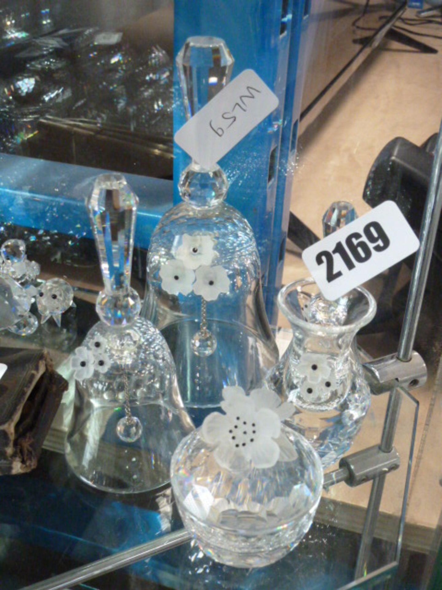 Cut glass bells and other glass vases