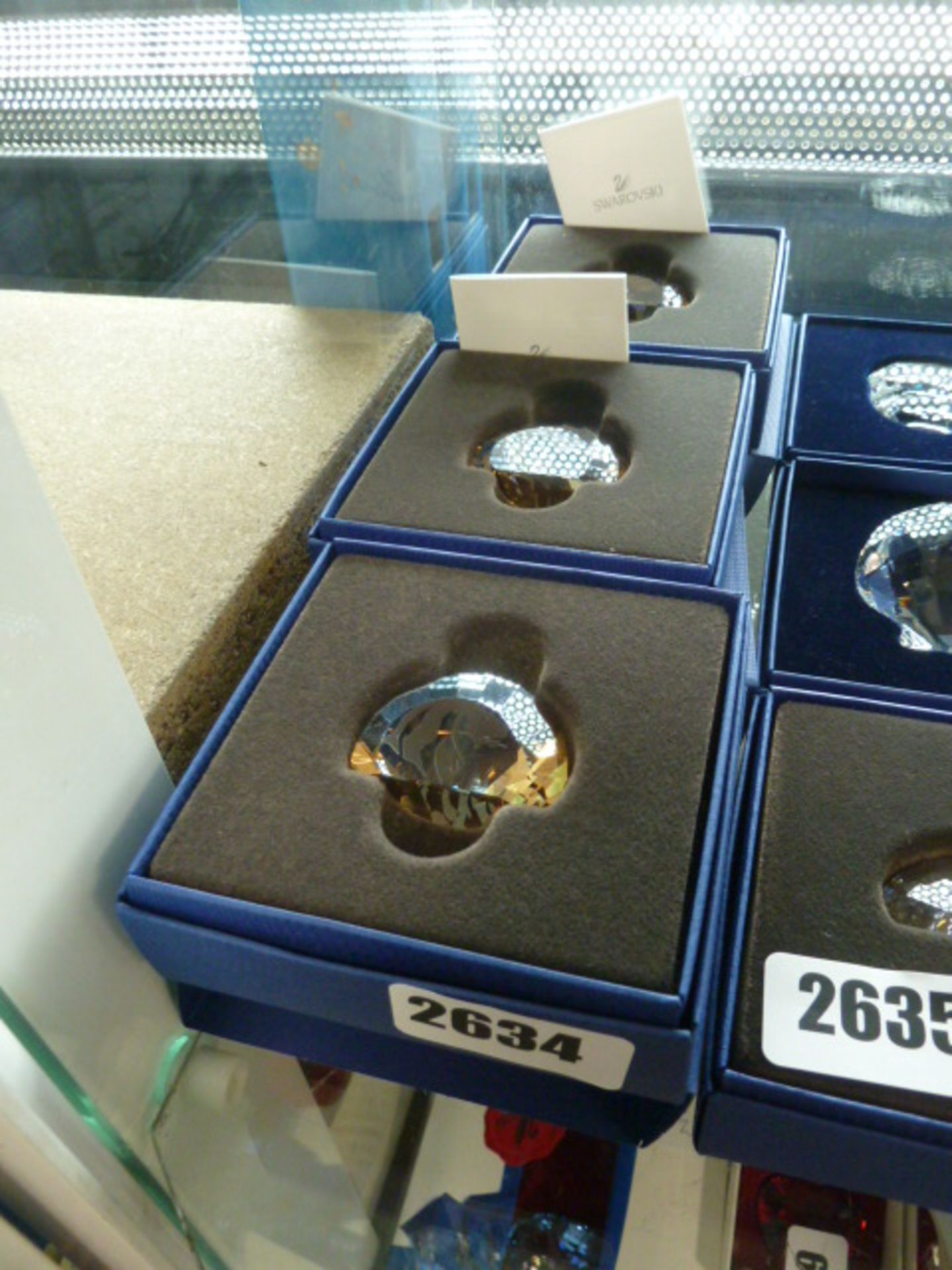 3 Swarovski items with lion pictured