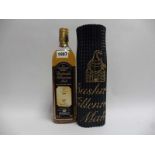 A bottle of Bushmills Millennium Malt Single Malt Irish Whiskey distilled in 1975,