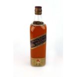 An old bottle of Johnnie Walker Red Label Old Scotch Whisky,