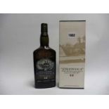 A bottle of Strathisla 12 year old Pure Highland Malt Sotch Whisky,