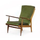 A 1970's teak and beech armchair with green upholstery by Scandart