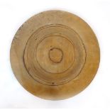 Attributed to Eero Saarinen, a turned birch charger, lacking label, d.