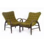 A pair of 1950's green and yellow fleck upholstered lounge armchairs,