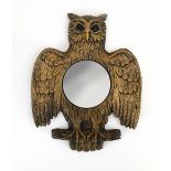 A 1970's French figural mirror modelled as an owl, the convex plate over four hooks, overall h.