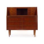 A 1960/70's teak bureau, the six small drawers and gallery over six further drawers,