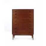 A 1950/60's walnut bow-fronted chest of seven drawers, on tapering beech legs with brass caps,