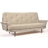 A 1950's sofa bed by Vono, the metal and sprung frame with grey woolen herringbone upholstery,