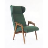 A 1950's Czech wingback armchair,