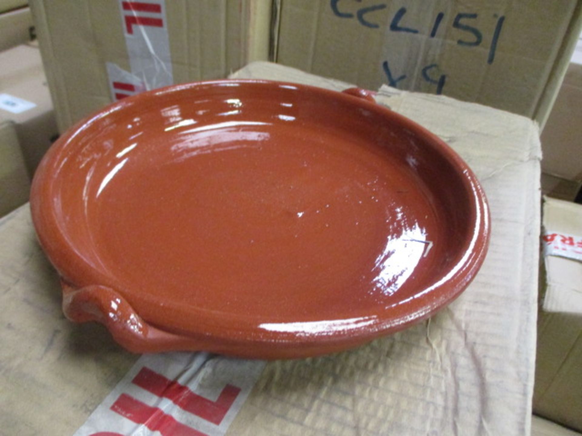 Pallet of stoneware serving dishes, bowls and oval plates