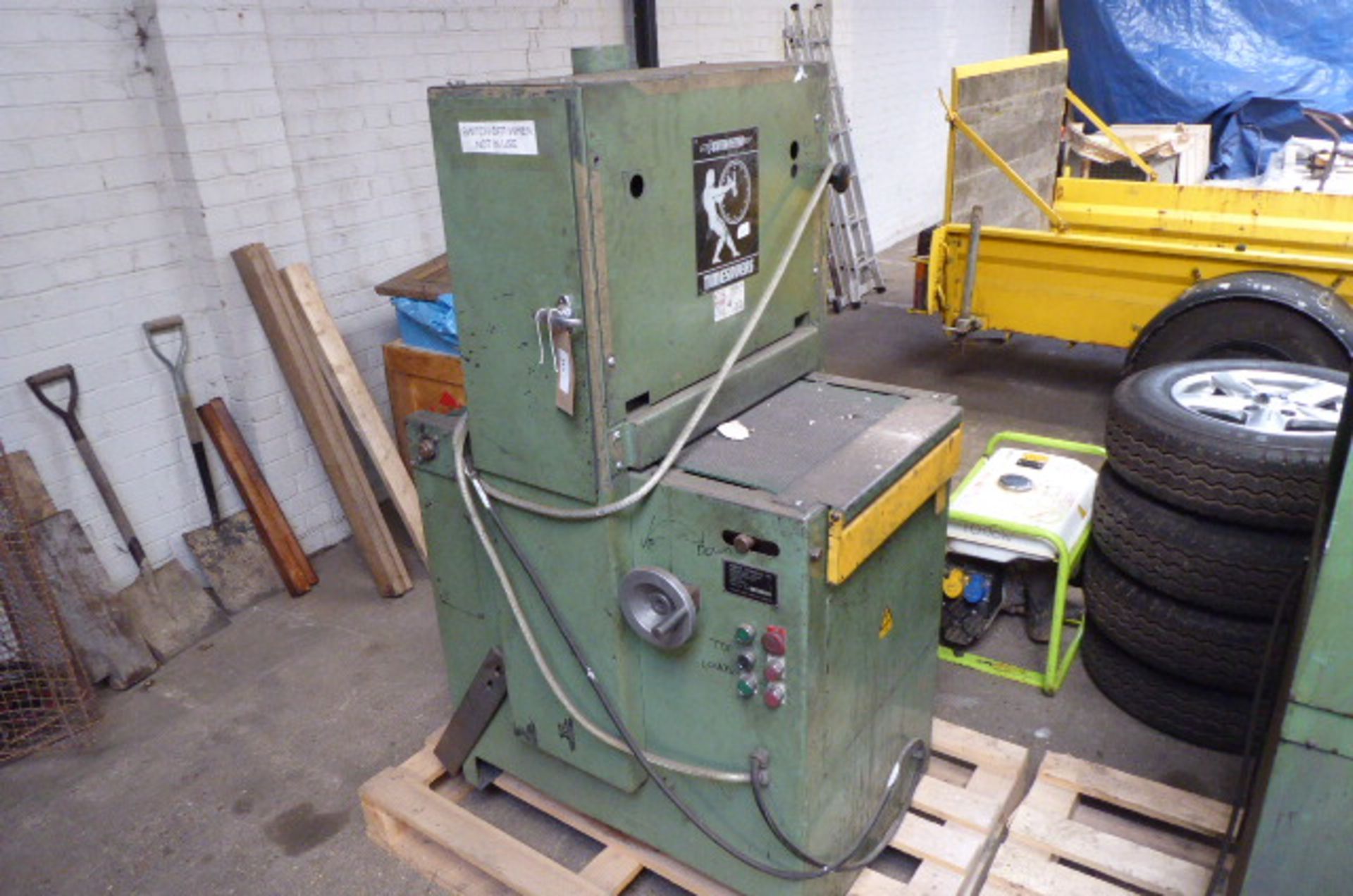 Birkett Cutmaster Ltd. belt linisher with horizontal conveyor belt, 3 phase with a Spensead