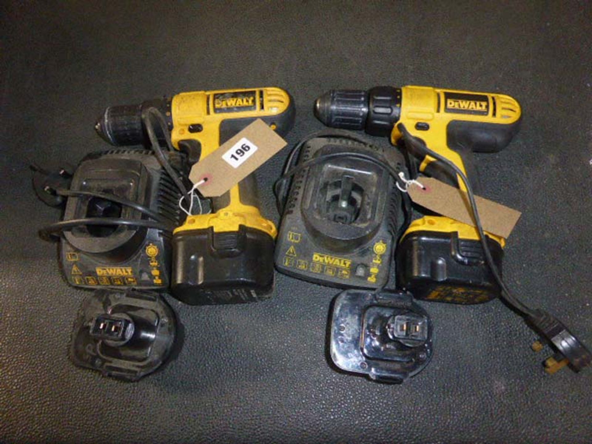 2 Dewalt 12v battery drills each with 2 batteries and charger