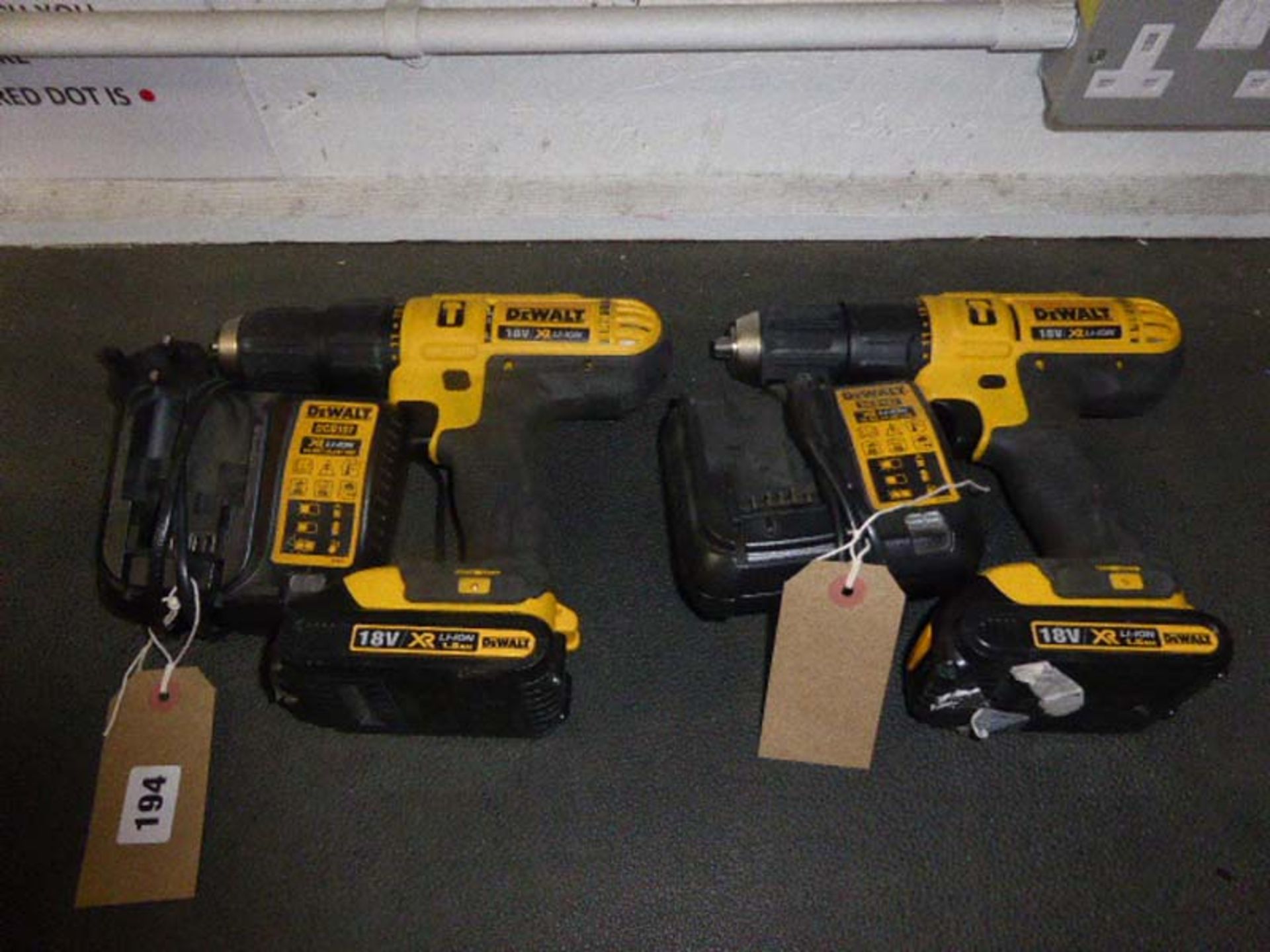 2 Dewalt 18v XRLI-ION drills each with a battery and charger