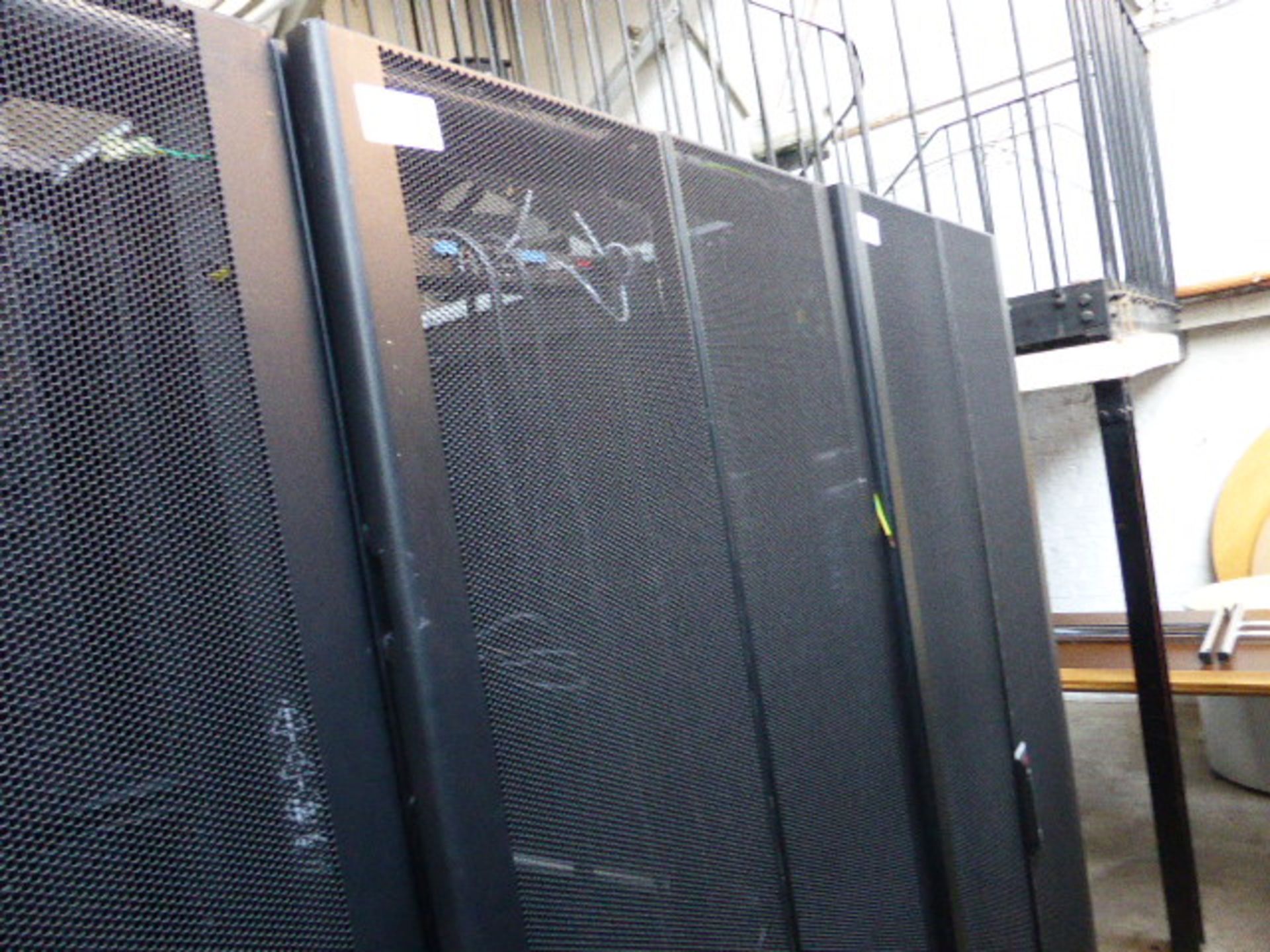 APC server cabinet on castors 75cm wide with 2 APC switch rack PDU units each with 24 outputs on