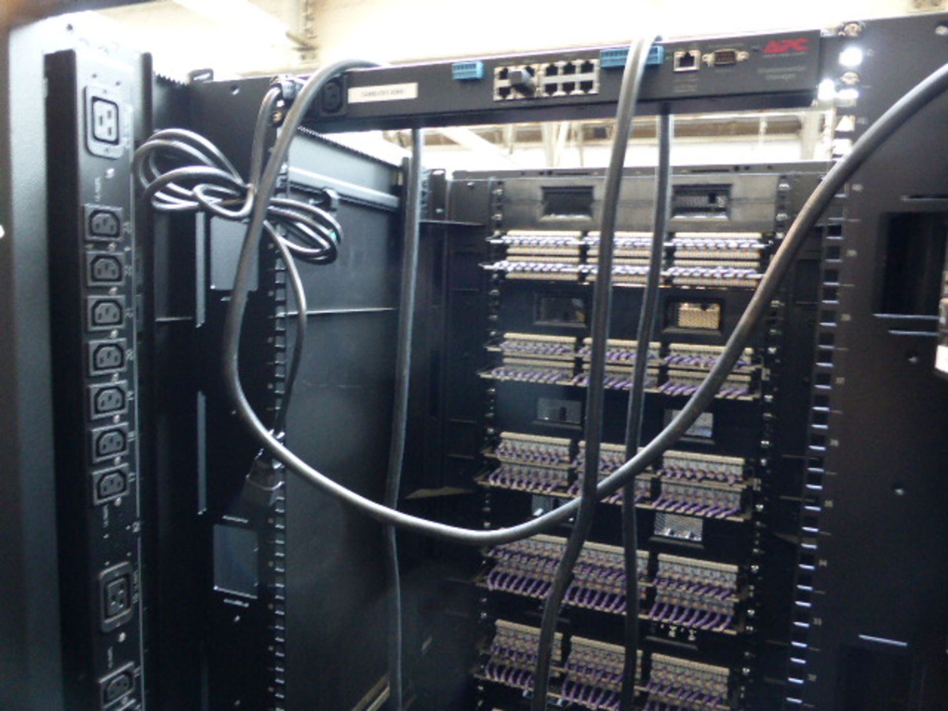 APC server cabinet on castors 75cm wide with 2 APC switch rack PDU units each with 24 outputs on - Image 2 of 2