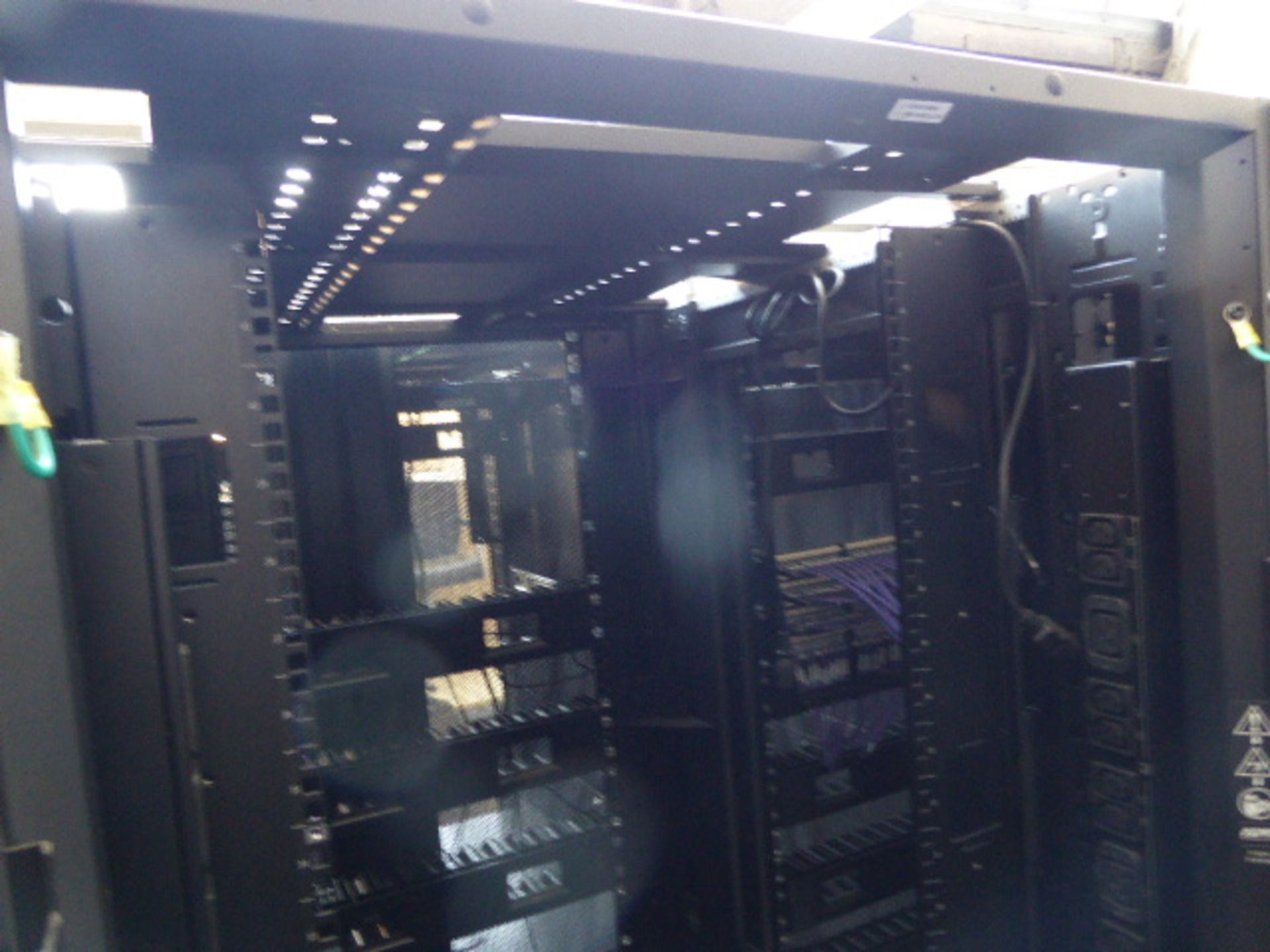 APC server cabinet on castors 75cm wide with 2 APC switch rack PDU units each with 24 outputs on - Image 2 of 2