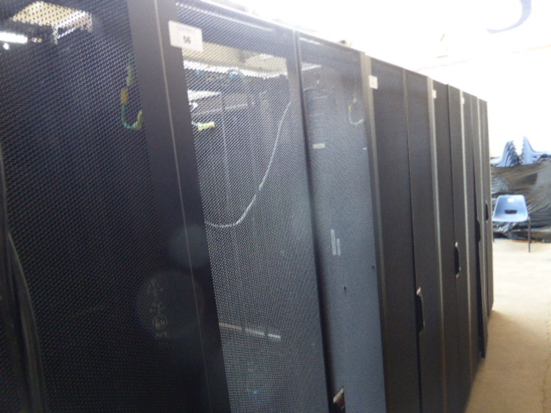 APC server cabinet on castors 75cm wide with 2 APC switch rack PDU units each with 24 outputs on