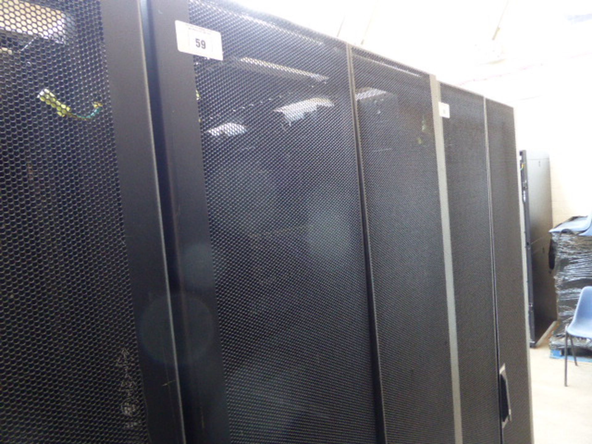 APC server cabinet on castors 75cm wide with 2 APC switch rack PDU units each with 24 outputs on