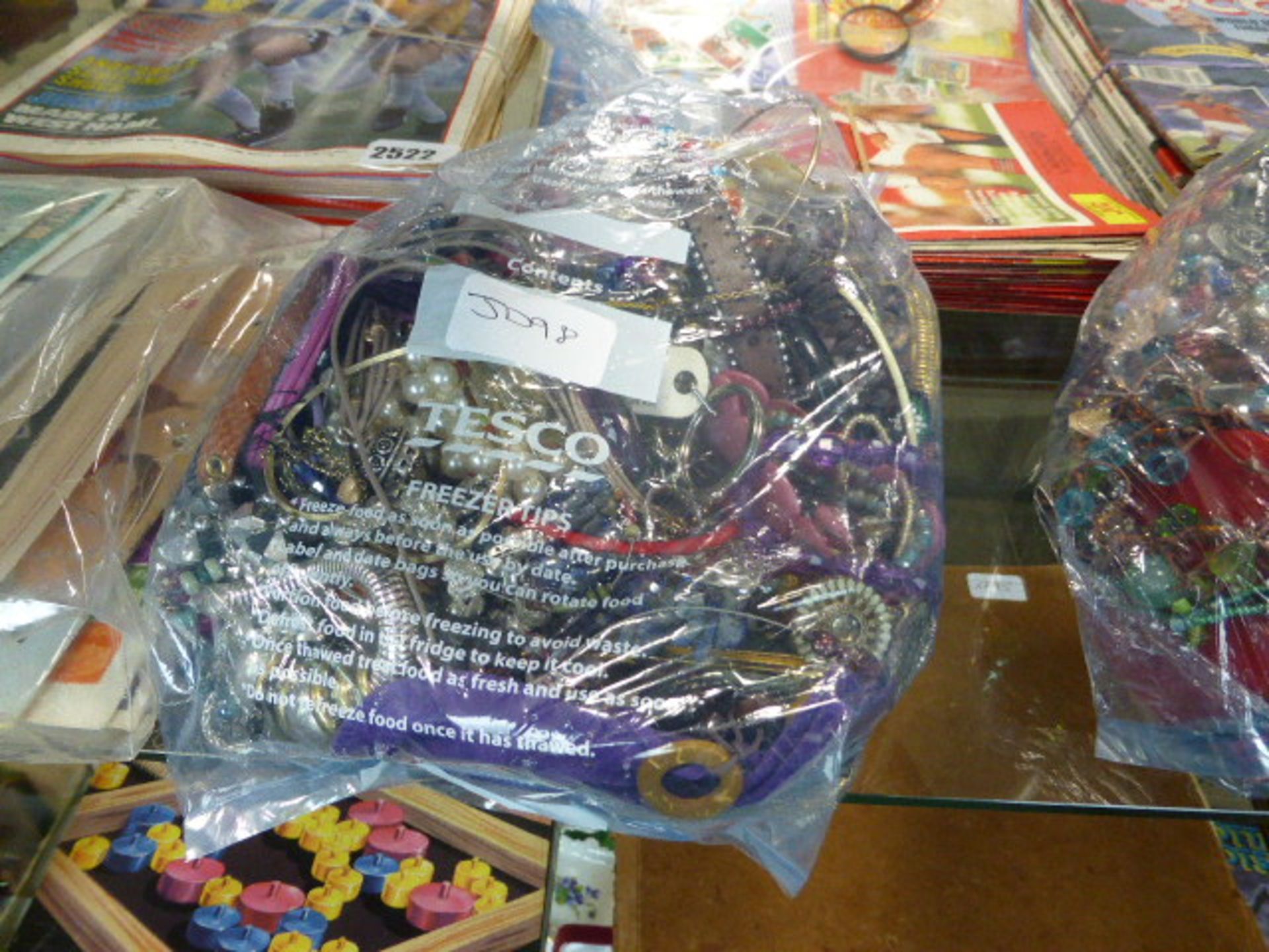 2414 Bag of mixed costume jewelry items