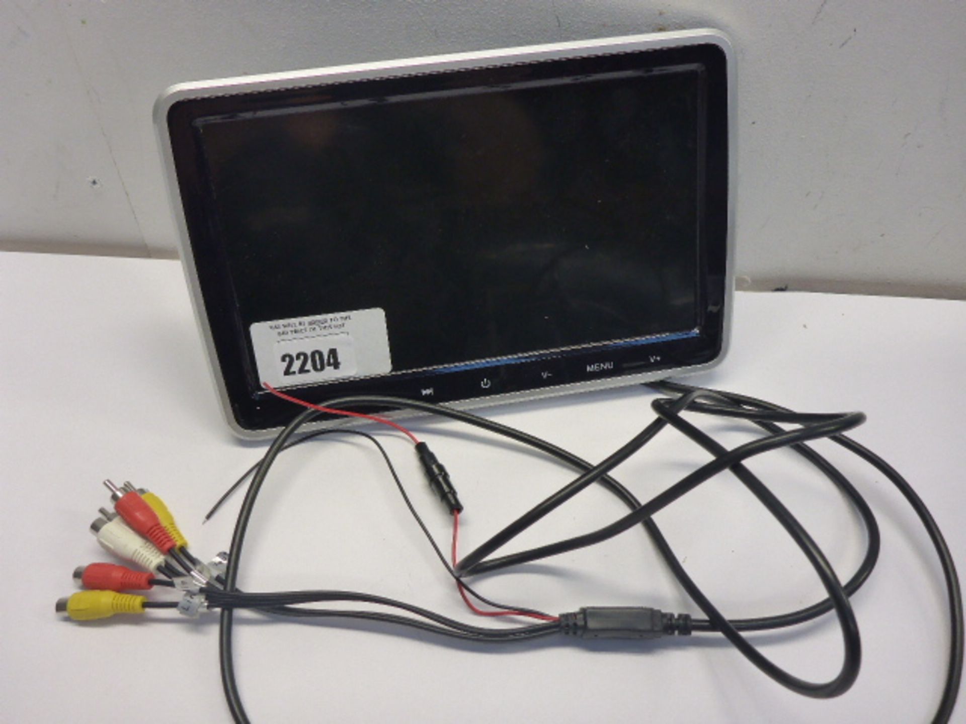 In-car portable LCD screen with audio/visual cables.