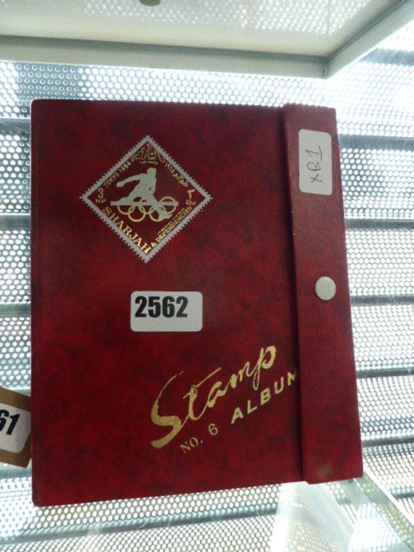 No. 6 stamp album and various world stamps