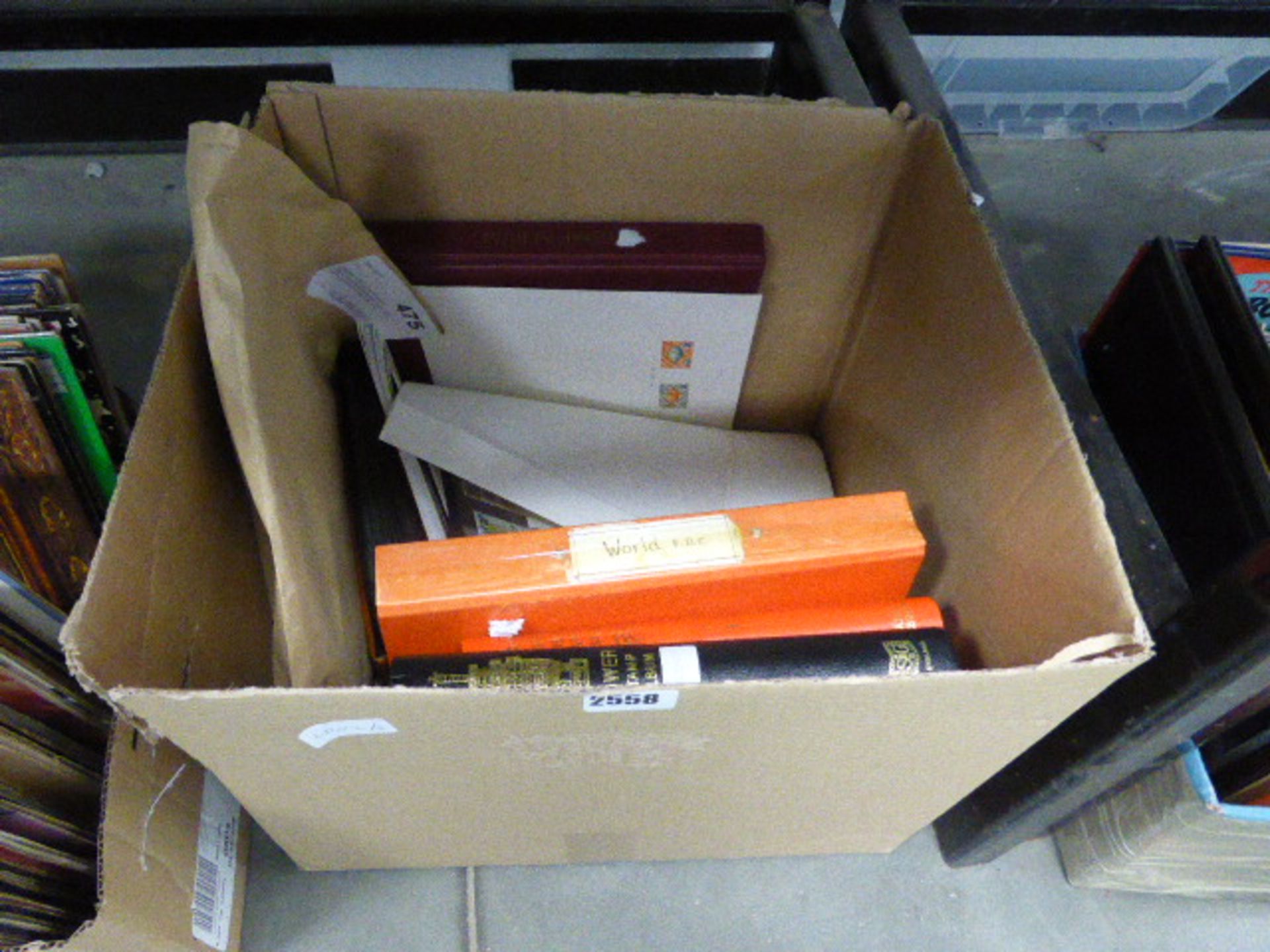 Large box of loose stamps and albums