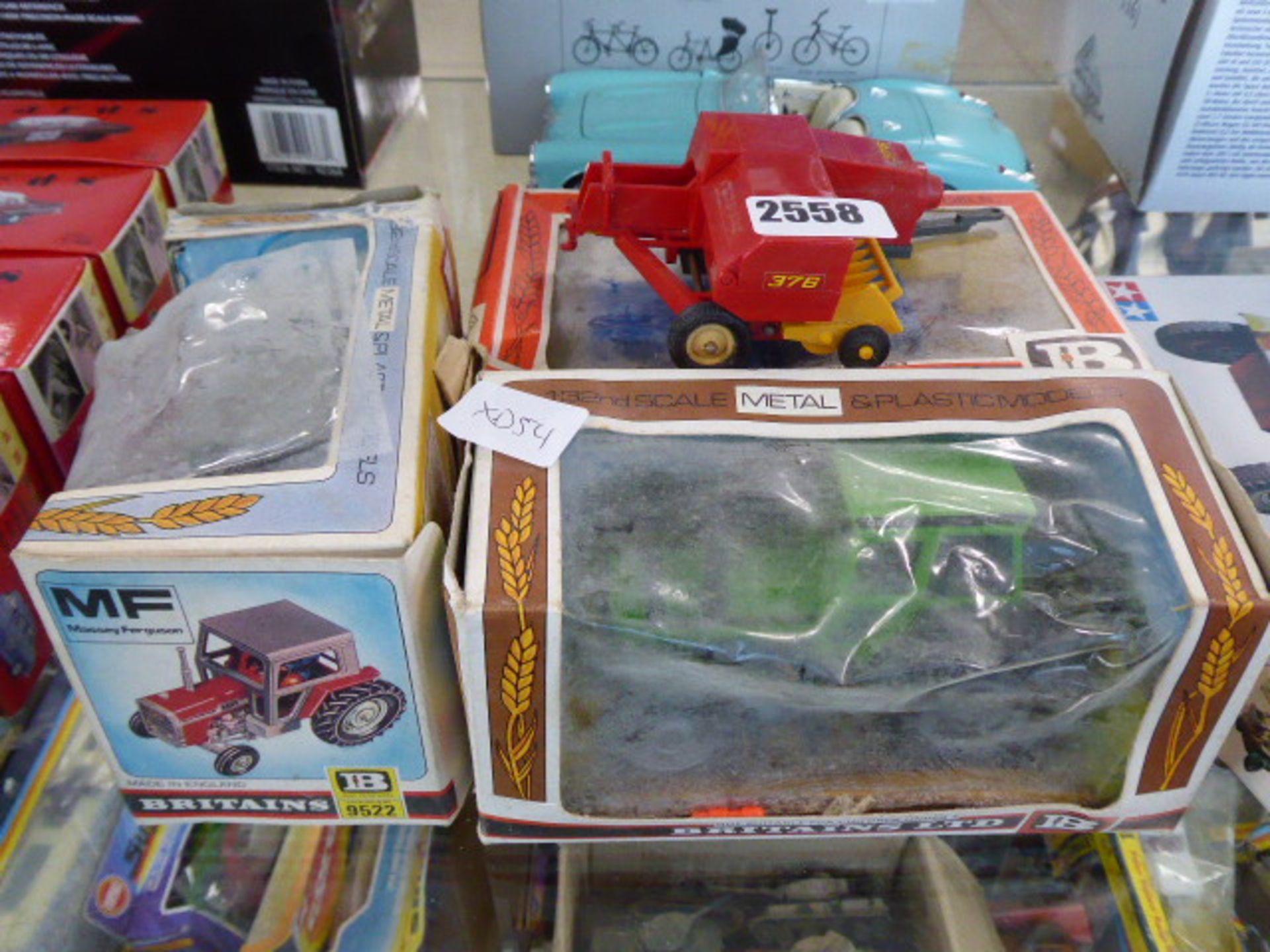 Selection of Britains tractors in boxes (AF)