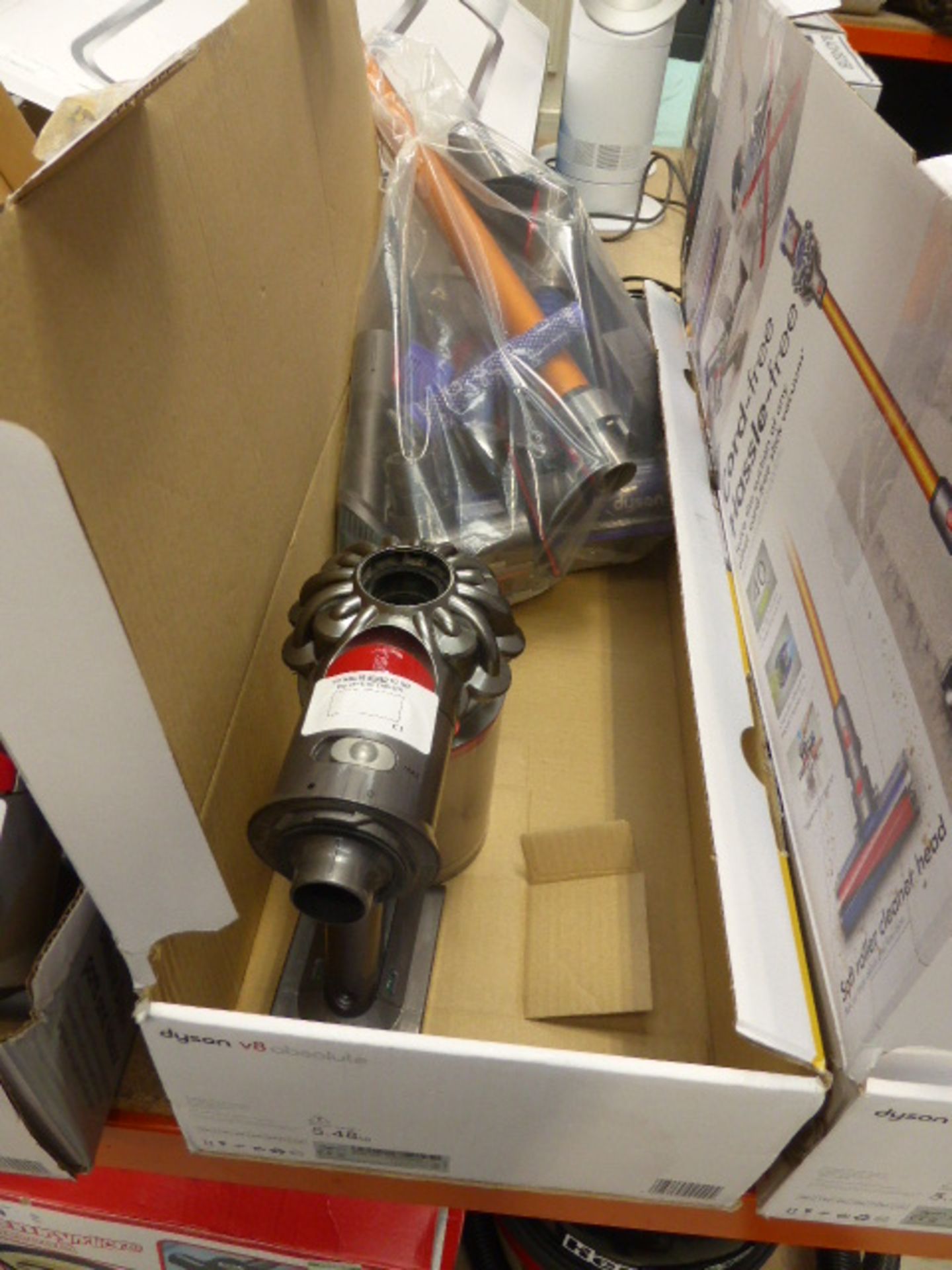 Hand held Dyson V8 absolute with box and accessories