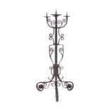 A German wrought metal four branch candelabrum, stamped 'Weihn 1940', h.