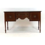 A late 19th/early 20th century mahogany and strung bow-fronted kneehole side table with two doors