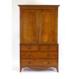 A Victorian mahogany linen press,