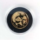 A Magnificent Seven Coin Collection gold 1/4 oz Chinese Panda coin, dated 2006