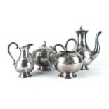 A Victorian silver and parcel gilt four piece tea service of globular form,