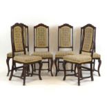 A set of six 17th century and later Dutch oak dining chairs with shaped aprons,