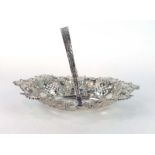 A late Victorian pierced silver basket of oval form decorated in the rococo manner, maker TL,