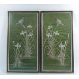 A pair of early 20th century Japanese longstitch embroideries depicting cranes amongst irises on a